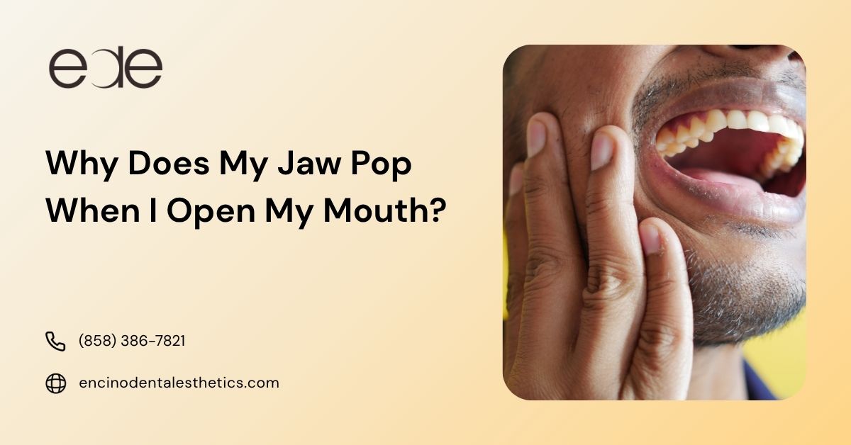 Man touching his jaw while opening his mouth, illustrating jaw popping or clicking.